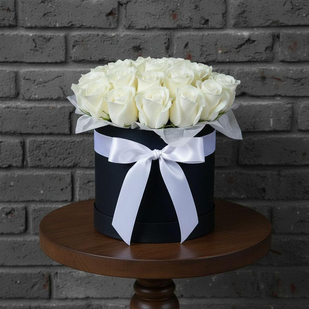 Цветочная композиция из Розы в шляпной коробке в Нижнем Икорце